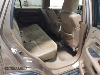 2004 Honda CR-V EX with VIN JHLRD78814C057877, listed as a IAAI auction lot 42065687 with 220,207 mi miles and . Bid and sale history available at carsss.com. Image 8.