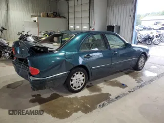1998 Mercedes-Benz E-Class with VIN WDBJF65F6WA590094, listed as a Copart auction lot 72751984 with 196,048 mi miles and Salvage Title. Bid and sale history available at carsss.com. Image 3.
