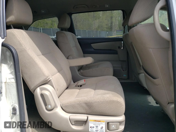 2014 Honda Odyssey LX with VIN 5FNRL5H27EB116435, listed as a Copart auction lot 52864825 with 94,643 mi miles and Salvage Title. Bid and sale history available at DreamBid. Image 11.