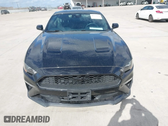 2021 Ford Mustang EcoBoost z VIN 1FA6P8TH2M5140071, wystawiony jako IAAI lot #41775674 z przebiegiem 20 184 mil mil oraz . Historia ofert i sprzedaży dostępna na DreamBid. Obrazek 12.