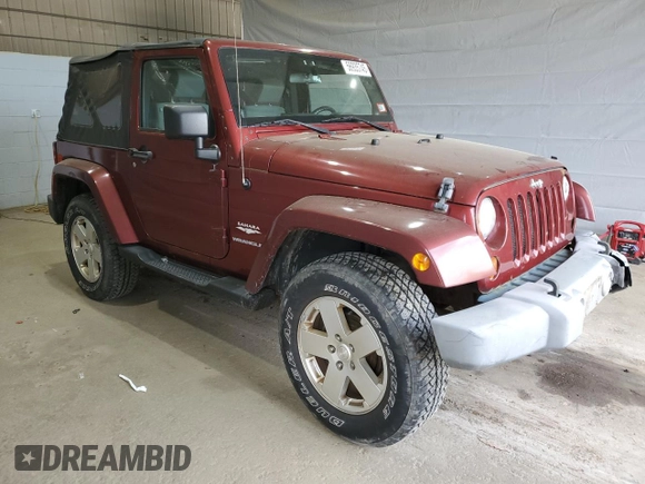 2010 Jeep Wrangler Sahara z VIN 1J4GA5D11AL106768, wystawiony jako Copart lot #56935745 z przebiegiem 143 212 mil mil oraz Szkoda całkowita • Salvage title. Historia ofert i sprzedaży dostępna na DreamBid. Obrazek 4.