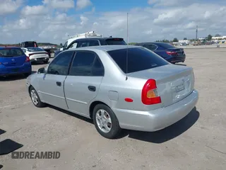 2002 Hyundai Accent GL with VIN KMHCG45C82U268756, listed as a IAAI auction lot 41569829 with 89,752 mi miles. Bid and sale history available at carsss.com. Image 3.