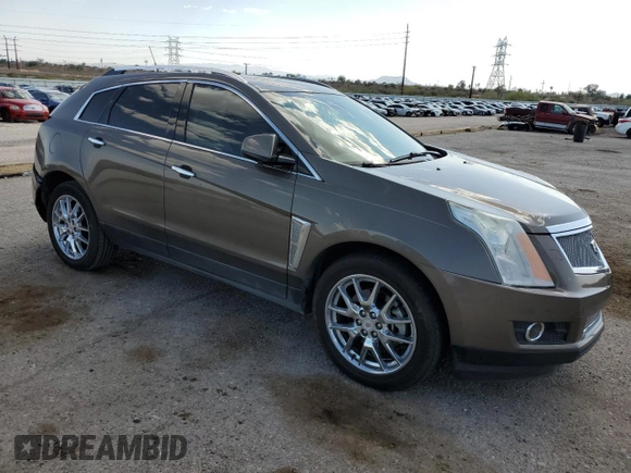 2014 Cadillac SRX Premium Collection z VIN 3GYFNDE37ES644966, wystawiony jako Copart lot #60501715 z przebiegiem 97 231 mil mil oraz Szkoda całkowita • Salvage title. Historia ofert i sprzedaży dostępna na DreamBid. Obrazek 4.
