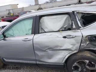 2019 Honda CR-V Touring with VIN 7FARW1H9XKE011269, listed as a IAAI auction lot 41258386 with 53,184 mi miles. Bid and sale history available at carsss.com. Image 14.
