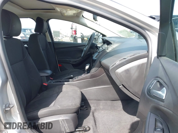 2015 Ford Focus SE with VIN 1FADP3F24FL203509, listed as a IAAI auction lot 41765582 with 139,856 mi miles. Bid and sale history available at carsss.com. Image 5.