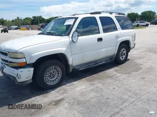 2005 Chevrolet Tahoe Z71 z VIN 1GNEC13T05R219656, wystawiony jako IAAI lot #42802342 z przebiegiem 265 766 mil mil oraz . Historia ofert i sprzedaży dostępna na DreamBid. Obrazek 2.