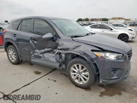 2016 Mazda CX-5 Touring z VIN JM3KE2CY7G0654292, wystawiony jako Copart lot #53433745 z przebiegiem 168 273 mil mil oraz Szkoda całkowita • Salvage title. Historia ofert i sprzedaży dostępna na DreamBid. Obrazek 4.
