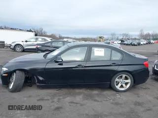 2014 BMW 3 Series 320i xDrive with VIN WBA3C3G59ENS70388, listed as a IAAI auction lot 41962815 with 195,393 mi miles. Bid and sale history available at carsss.com. Image 14.