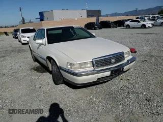 1994 Cadillac Eldorado ESC z VIN 1G6EL12Y6RU619510, wystawiony jako Copart lot #51524645 z przebiegiem 139 223 mil mil oraz Szkody całkowita. Historia ofert i sprzedaży dostępna na DreamBid. Obrazek 10.
