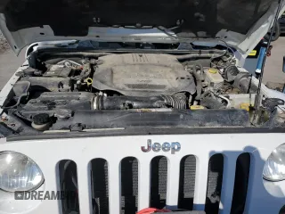2014 Jeep Wrangler Sahara with VIN 1C4AJWBGXEL125544, listed as a Copart auction lot 51961845 with 146,917 mi miles and Salvage title. Bid and sale history available at DreamBid. Image 14.