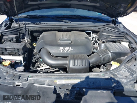 2013 Dodge Durango SXT with VIN 1C4RDJAG2DC530407, listed as a IAAI auction lot 41837441 with 133,375 mi miles and . Bid and sale history available at DreamBid. Image 10.