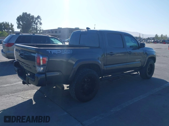 2020 Toyota Tacoma SR5 z VIN 3TMCZ5AN9LM296826, wystawiony jako IAAI lot #42533149 z przebiegiem 72 375 mil mil oraz . Historia ofert i sprzedaży dostępna na DreamBid. Obrazek 4.