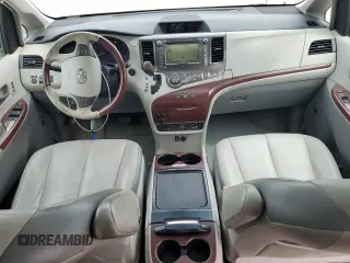 2012 Toyota Sienna XLE с VIN 5TDDK3DC8CS043732, выставлен на аукционе Copart как лот 58037885 с пробегом 234 881 миль миль и Списание • Salvage title. История ставок и продаж доступна на DreamBid. Изображение 8.