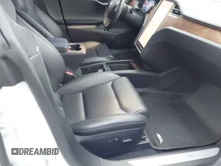 2020 Tesla Model S Long Range with VIN 5YJSA1E27LF370700, listed as a IAAI auction lot 41703463 with 26,024 mi miles and . Bid and sale history available at carsss.com. Image 5.