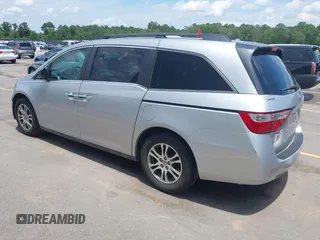 2012 Honda Odyssey EX-L with VIN 5FNRL5H65CB076534, listed as a IAAI auction lot 42440258 with 150,866 mi miles and . Bid and sale history available at DreamBid. Image 3.