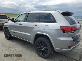2018 Jeep Grand Cherokee Laredo E with VIN 1C4RJFAG0JC173200, listed as a Copart auction lot 55326805 with 127,489 mi miles and Salvage Title. Bid and sale history available at DreamBid. Image 2.