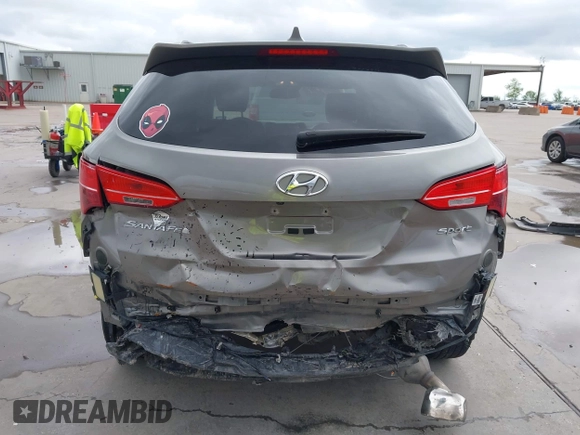 2014 Hyundai Santa Fe with VIN 5XYZU3LB2EG155127, listed as a IAAI auction lot 41864518 with Not provided miles and . Bid and sale history available at DreamBid. Image 6.