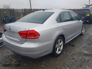 2013 Volkswagen Passat SE w/Sunroof with VIN 1VWBP7A37DC078427, listed as a IAAI auction lot 41942792 with 111,568 mi miles. Bid and sale history available at carsss.com. Image 4.