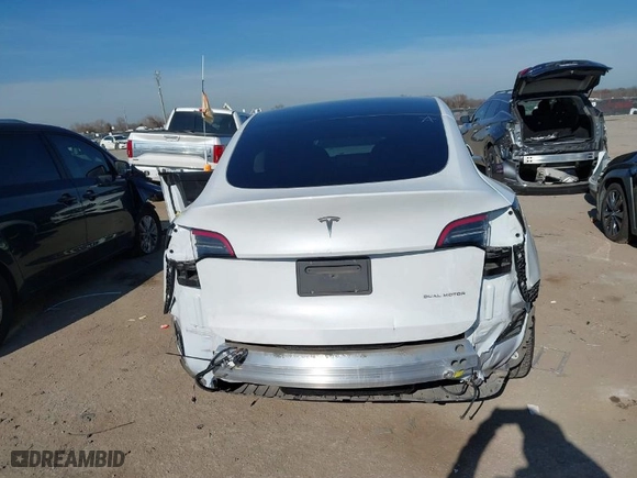2023 Tesla Model Y Long Range with VIN 7SAYGAEEXPF598086, listed as a IAAI auction lot 41125984 with NaN miles. Bid and sale history available at carsss.com. Image 6.