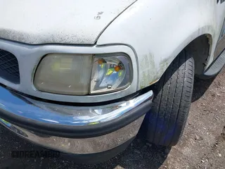 2002 Ford F-150 XL with VIN 2FTRF17W42CA29034, listed as a IAAI auction lot 42134017 with Not Provided miles and . Bid and sale history available at DreamBid. Image 12.