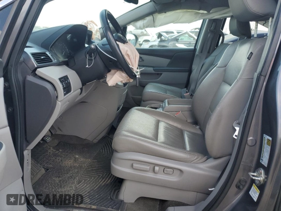 2014 Honda Odyssey EX-L with VIN 5FNRL5H64EB123541, listed as a Copart auction lot 52483705 with 77,996 mi miles and Salvage Title. Bid and sale history available at DreamBid. Image 7.