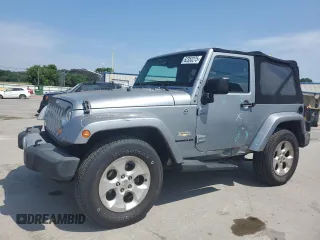 2015 Jeep Wrangler Sahara with VIN 1C4AJWBG1FL705900, listed as a Copart auction lot 62353275 with 64,866 mi miles and Salvage title. Bid and sale history available at DreamBid. Image 1.