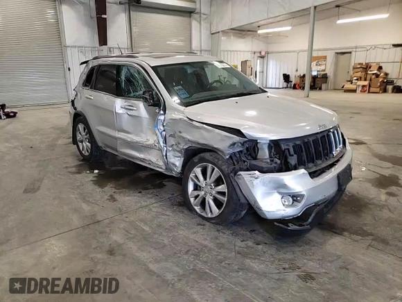 2011 Jeep Grand Cherokee 70th Anniversary with VIN 1J4RR4GG0BC666357, listed as a Copart auction lot 71726674 with 122,802 mi miles and Salvage Title. Bid and sale history available at carsss.com. Image 12.