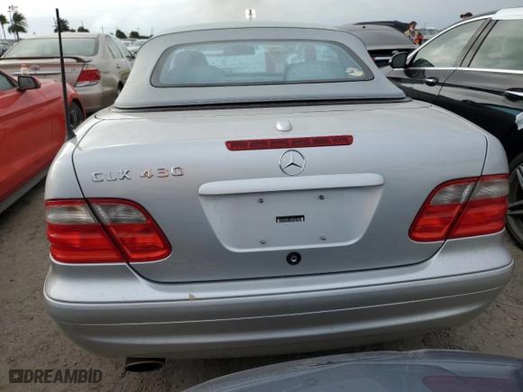 2003 Mercedes-Benz CLK-Class 4.3L with VIN WDBLK70G53T141578, listed as a Copart auction lot 74977354 with 35,736 mi miles and Salvage Title. Bid and sale history available at carsss.com. Image 6.