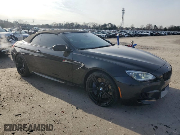 2014 BMW M6 z VIN WBSLZ9C54ED651171, wystawiony jako Copart lot #84425644 z przebiegiem 73 352 mil mil oraz Szkoda całkowita • Salvage title. Historia ofert i sprzedaży dostępna na DreamBid. Obrazek 4.