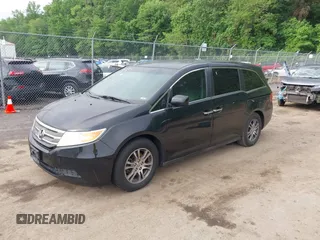 2011 Honda Odyssey EX-L with VIN 5FNRL5H68BB071178, listed as a IAAI auction lot 42286324 with 213,847 mi miles and . Bid and sale history available at DreamBid. Image 2.