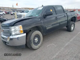 2013 Chevrolet Silverado 1500 LT with VIN 3GCPKSE72DG294500, listed as a IAAI auction lot 41619152 with 125,648 mi miles. Bid and sale history available at carsss.com. Image 2.