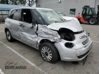 2014 FIAT 500L Easy with VIN ZFBCFABH0EZ024955, listed as a Copart auction lot 82365864 with Not Provided miles and Salvage Title. Bid and sale history available at DreamBid. Image 4.