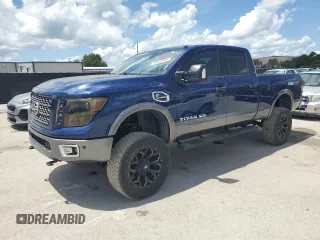 2016 Nissan Titan Pro-4X with VIN 1N6BA1F44GN506625, listed as a Copart auction lot 66031425 with 140,884 mi miles and Clean title. Bid and sale history available at DreamBid. Image 1.