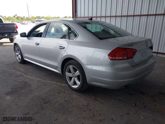 2014 Volkswagen Passat Wolfsburg Ed with VIN 1VWAS7A32EC036193, listed as a IAAI auction lot 41606595 with 77,536 mi miles. Bid and sale history available at carsss.com. Image 3.