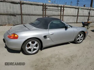 2002 Porsche Boxster z VIN WP0CA298X2U622776, wystawiony jako Copart lot #57521485 z przebiegiem 111 257 mil mil oraz Czysty tytuł • Clean title. Historia ofert i sprzedaży dostępna na DreamBid. Obrazek 3.