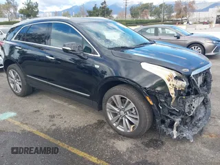 2024 Cadillac XT5 FWD Premium Luxury with VIN 1GYKNCRS6RZ745077, listed as a IAAI auction lot 41247248 with 3,302 mi miles. Bid and sale history available at carsss.com. Image 1.