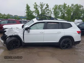 2022 Volkswagen Atlas SE with VIN 1V2KR2CA0NC509427, listed as a IAAI auction lot 42440164 with 52,898 mi miles and . Bid and sale history available at DreamBid. Image 13.