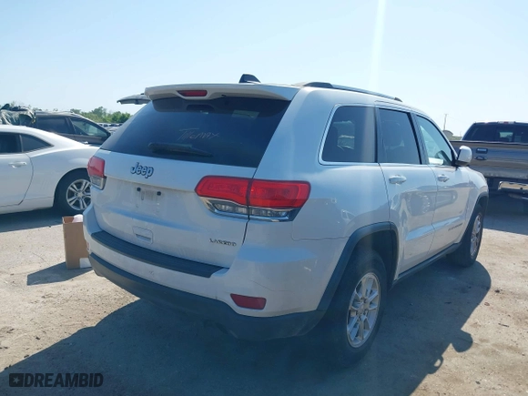 2014 Jeep Grand Cherokee Laredo with VIN 1C4RJEAG2EC107005, listed as a IAAI auction lot 41970670 with 299,211 mi miles. Bid and sale history available at carsss.com. Image 4.