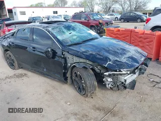 2023 Kia K5 GT-Line z VIN 5XXG64J25PG205939, wystawiony jako IAAI lot #42097108 z przebiegiem 31 101 mil mil oraz . Historia ofert i sprzedaży dostępna na DreamBid. Obrazek 1.