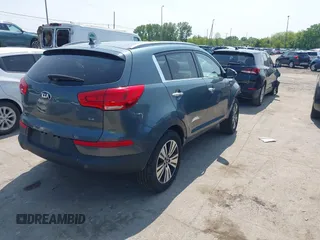 2015 Kia Sportage EX with VIN KNDPCCAC3F7720683, listed as a IAAI auction lot 42390430 with 102,867 mi miles and . Bid and sale history available at DreamBid. Image 4.