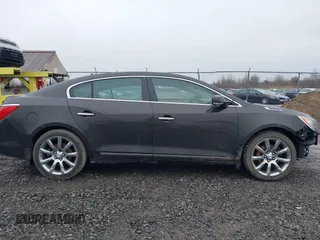 2014 Buick LaCrosse Leather with VIN 1G4GB5G30EF178500, listed as a IAAI auction lot 42016329 with 144,090 mi miles. Bid and sale history available at carsss.com. Image 14.