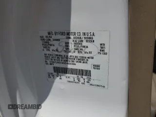 2005 Ford Escape XLT z VIN 1FMYU93145DA04306, wystawiony jako Copart lot #56209425 z przebiegiem 124 956 mil mil oraz Szkoda całkowita • Salvage title. Historia ofert i sprzedaży dostępna na DreamBid. Obrazek 13.