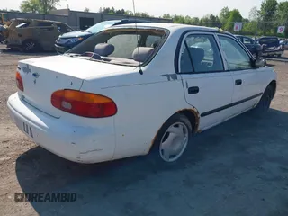 1998 Chevrolet Prizm Lsi z VIN 1Y1SK5281WZ420918, wystawiony jako IAAI lot #42360651 z przebiegiem 108 178 mil mil oraz . Historia ofert i sprzedaży dostępna na DreamBid. Obrazek 4.