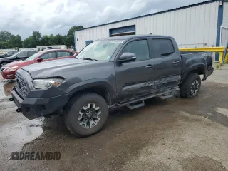 2020 Toyota Tacoma SR5 with VIN 3TMCZ5AN6LM296279, listed as a Copart auction lot 60069485 with 107,415 mi miles and Salvage title. Bid and sale history available at DreamBid. Image 1.