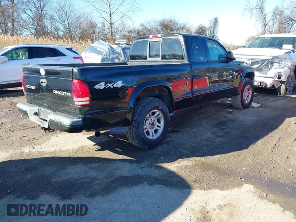2004 Dodge Dakota Sport with VIN 1D7HG32N24S518815, listed as a IAAI auction lot 41408182 with 267,160 mi miles. Bid and sale history available at carsss.com. Image 4.