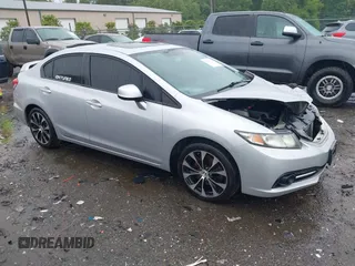 2013 Honda Civic Si with VIN 2HGFB6E52DH702559, listed as a IAAI auction lot 42355053 with 128,567 mi miles and . Bid and sale history available at DreamBid. Image 1.
