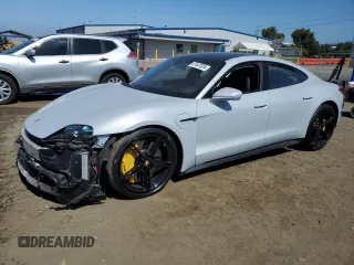 2021 Porsche Taycan Turbo z VIN WP0AC2Y19MSA62630, wystawiony jako Copart lot #61647024 z przebiegiem Nie podano mil oraz Szkoda całkowita • Salvage title. Historia ofert i sprzedaży dostępna na DreamBid. Obrazek 1.