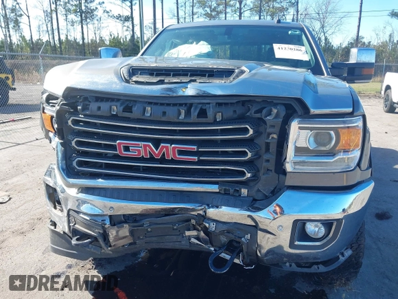 2017 GMC Sierra 2500HD SLT with VIN 1GT12TEY1HF165837, listed as a IAAI auction lot 41230286 with 167,824 mi miles. Bid and sale history available at carsss.com. Image 6.