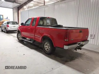 1997 Ford F-150 XL with VIN 1FTEX18L7VKD72386, listed as a IAAI auction lot 41667913 with 168,813 mi miles. Bid and sale history available at carsss.com. Image 3.