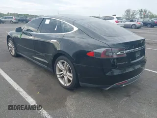 2014 Tesla Model S 60 with VIN 5YJSA1H13EFP33693, listed as a IAAI auction lot 42132094 with Not Provided miles and . Bid and sale history available at DreamBid. Image 3.